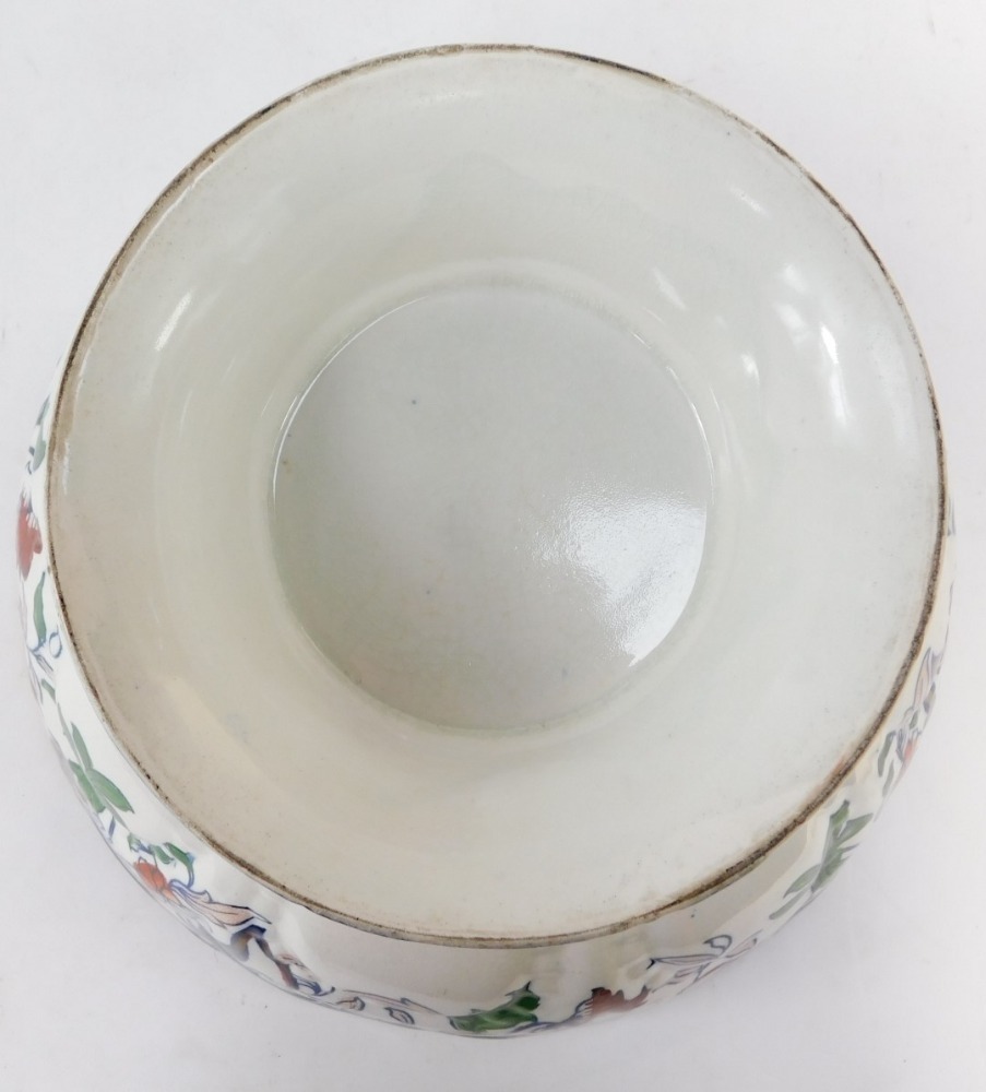 A Masons Ironstone style punch bowl, the yellow rim with imari style painted detail, on a