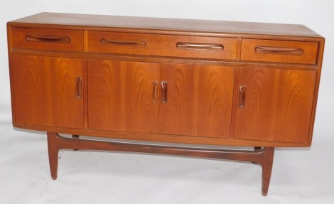 A G-Plan teak sideboard, with drawers, cupboards and turned legs, 83cm high, 152cm wide, 46cm deep.