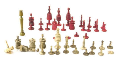 A 19thC white and red stained bone chess set, the King 10cm high. (AF)