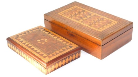 Two early 20thC olive wood and marquetry inlaid boxes, comprising a jewellery with a fitted interior, 9cm high, 33cm wide, 19cm deep, and a further box with plain interior, 4cm high, 26cm wide, 17cm deep. (2)