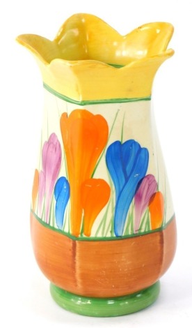 A Clarice Cliff Autumn Crocus pattern tulip vase, with yellow fluted top, painted mark Bizarre Clarice Cliff, 20cm high.