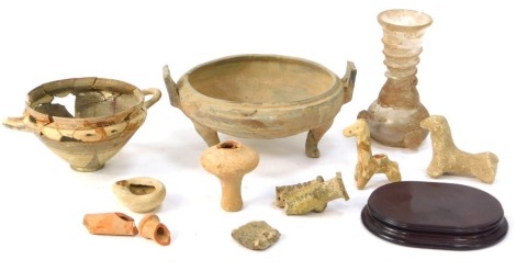 Roman pottery and glass ware, comprising glass vase with prunt applied detail, 14cm high, animal figures, 6cm high, three footed bowl, 8cm high, etc, (AF). (a quantity)