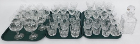 A suite of Royal Albert Country Rose crystal glassware, comprising red and white wine glasses, sherry, port and liqueur glasses, whisky and water tumblers, decanter, champagne coupes and brandy balloons. (3 trays)