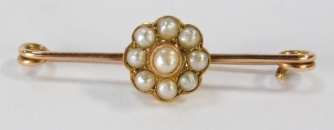 A cultured pearl bar brooch, the central cluster design set with an arrangement of cluster pearls, in yellow metal frame, unmarked, 3.5cm wide, 1.7g all in.