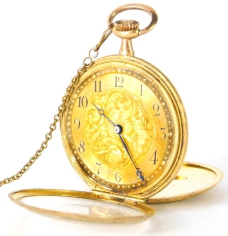 A Continental fob watch, with engine turned design and numeric dial with blue handles, bezel wind, yellow metal stamped 18k, the outer case with enamel floral design to rear, and safety chain, 3cm diameter, 22.2g all in.