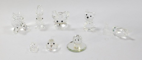 A group of Swarovski Crystal ornaments, comprising bear, robin, swan, pig, owl, squirrel, mouse and large pig, (AF). (8)