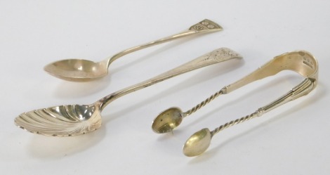 A group of silver ware, comprising a silver Southampton crested teaspoon, a pair of Victorian silver sugar nips, and a silver engine engraved and shell capped spoon, 1 ¼oz. (3)