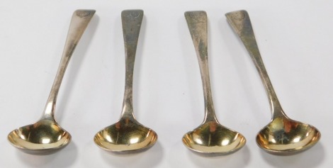 A set of four Victorian silver salt spoons, with fiddle pattern top, bearing the crest and initial G, London 1883, 1¼oz.