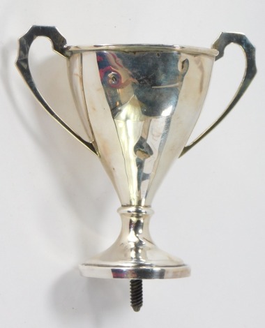 A George VI silver trophy cup, of hammered design, lacking base, Birmingham 1937, 1 ¼oz gross.