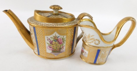 A 19thC French porcelain teapot and milk jug, each heavily gilt decorated with floral panels and blue banding, 11cm high and 10cm high respectively. (2)