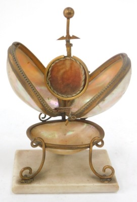 A 19thC French mother of pearl and brass Palais Royale watch stand, the two capped shell top with bowl on a rectangular foot, 16cm high, 10cm wide, 7cm deep. - 2