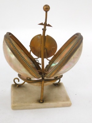 A 19thC French mother of pearl and brass Palais Royale watch stand, the two capped shell top with bowl on a rectangular foot, 16cm high, 10cm wide, 7cm deep. - 3