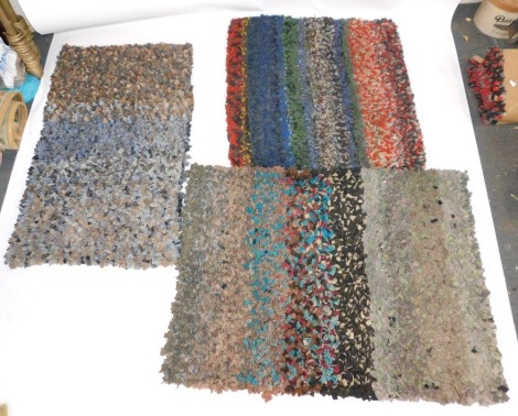 Three peg or rag rugs, of varying colours, 157cm x 115cm, 116cm x 116cm and 147cm x 91cm. (3)