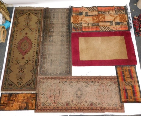 Seven Persian style and other rugs, various sizes and colours. (7, AF)