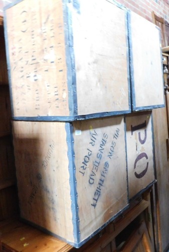 Four metal bound wooden tea chests.