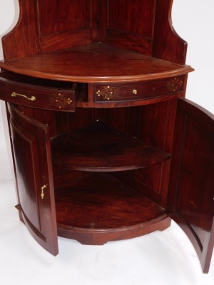 An Eastern hardwood bow front corner display cabinet, with brass inlaid decoration. (AF) - 3