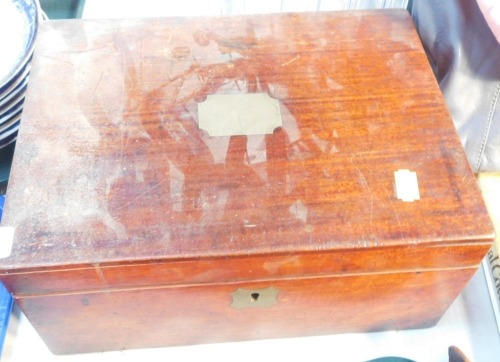 A 19thC mahogany writing box, with brass bound top, with vacant interior.