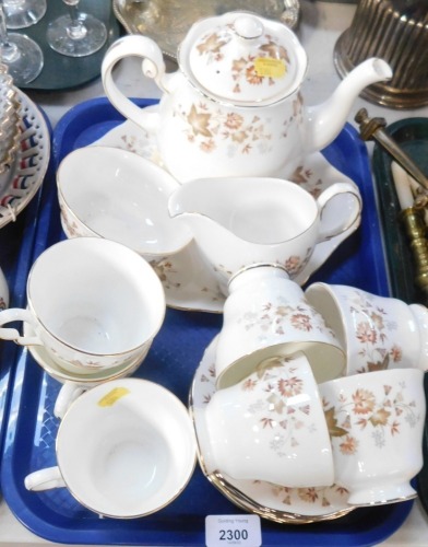 A Colclough Avon pattern part tea service, comprising seven cups, six saucers, cake plate, milk jug, sugar bowl and teapot. (1 tray)