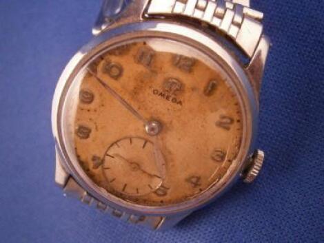 An Omega steel cased gent's wristwatch with articulated strap