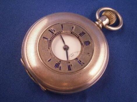 A continental silver half Hunter pocket watch