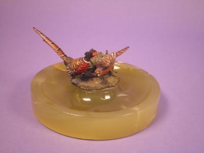 A green onyx circular ash tray mounted with a cold painted bronze group of pheasants