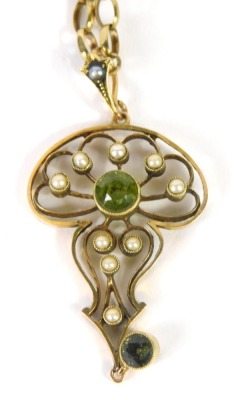 An Edwardian drop pendant, set with pearls, centred by a peridot in a floral surround with further drop green stone, attached to a 9ct gold belcher necklace, 48cm long, 10.7g all.