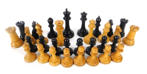 An early 20thC Staunton style chess set, with 10cm high black king, contained in a George III tea caddy with brass handle. (a quantity, AF)