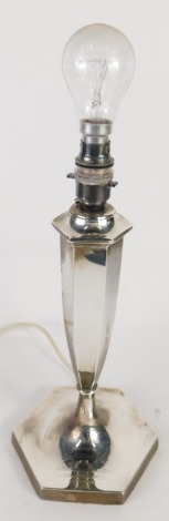 A George V silver candlestick or table lamp, by Sharman D Neill, of octagonal form, with later fittings and blue shade, Sheffield 1918, Sharman D Neill Ltd Belfast stamp, 48cm high. (weighted)