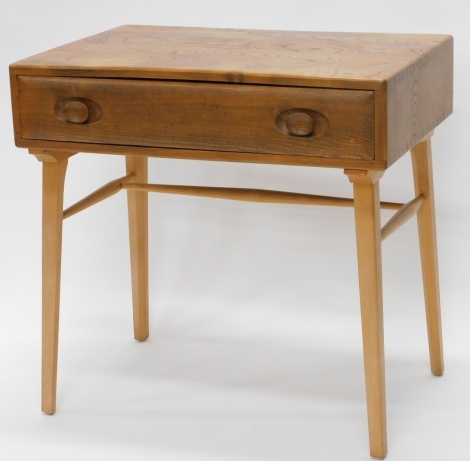 An Ercol elm small side table, with single drawer, with carved handles on square tapering legs, 68cm high, 68cm wide, 48cm deep.