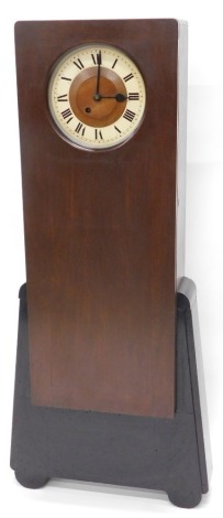 An unusual mahogany ebonised Art Deco style grandmother clock, with painted Roman numeric dial, the case of tapering form, with brass pendulum, 135cm high.