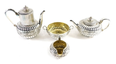 Withdrawn Pre Sale. A Victorian silver and silver gilt four piece tea service, by Goldsmiths Alliance Limited, comprising teapot, water jug, two handled sugar bowl and milk jug, heavily decorated with a repousse banding of acorn leaves and flower heads on