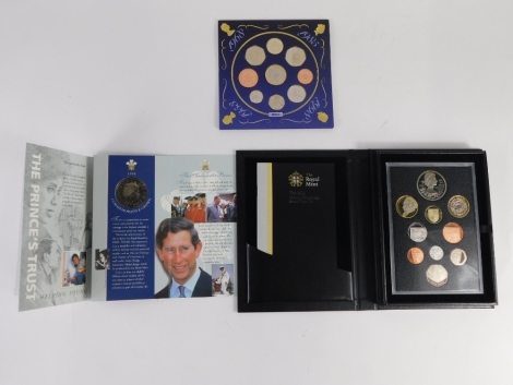 A Royal Mint 2012 United Kingdom proof coin set, a HRH Prince Of Wales 50th birthday commemorative crown, and a 1998 United Kingdom Uncirculated Coin Collection. (3)