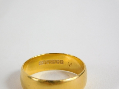 A 22ct plain wedding band, size M, 4.1g. - 2