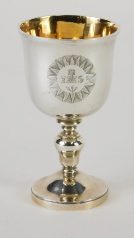 A George IV miniature silver gilt chalice, by Rebecca Emes and Edward Barnard, with bell shaped bowl, baluster stem and circular foot, with silver gilt interior, London 1827, 9cm high, 2.4oz.