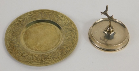 A Victorian silver gilt armada style shallow dish, by John Crane Salt, with a chased border, 11cm diameter, and a weighted ring stand, 4.7oz all in. (2)