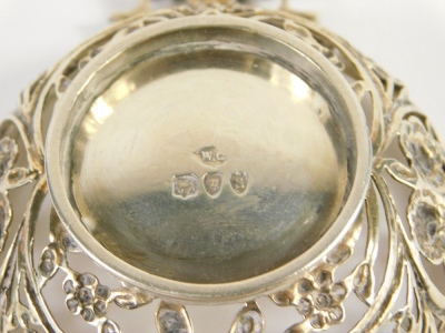 A Victorian silver miniature quaich shaped bon bon dish, by William Comyns, with pierced border and handles, on circular foot, London 1893, 10cm wide, 2.4oz. - 2