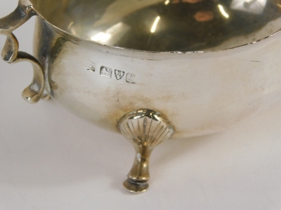 A George V silver sauce boat, with flying S scroll handle, acanthus capped triple hoof feet, Chester 1911, 7cm high, 3.4oz. - 2