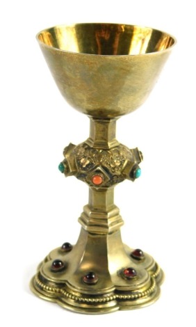 A Victorian silver gilt miniature chalice, with plain bowl elaborate stem inset with jewels, on a jewelled floral base, John Crane Salt, Pratt & Sons London retailers mark, London 1873, 10cm high 3.14oz all in.