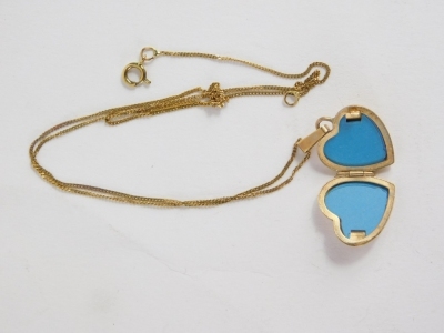 A 9ct gold heart shaped locket, 1cm high, attached to a slender link necklace, 1.9g all in. - 2