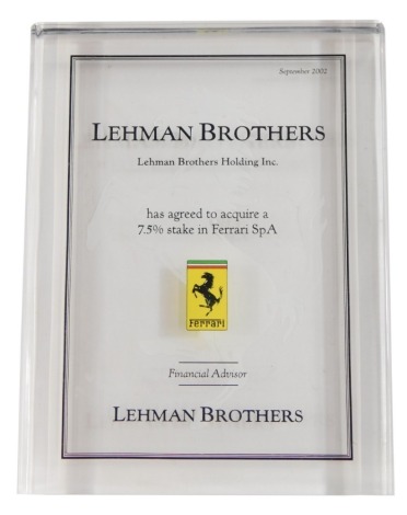 An official Lehman Brothers financial advisers Ferrari plaque, where they have had agreed to acquire a 7.5% stake in Ferrari SPA September 2002, 16cm high.