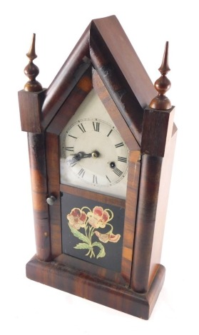 A 19thC New Haven American mantel clock, in yellow case, with 18cm diameter back plate with Roman numeric dial and glazed front door, with eight day movement, 54cm high.