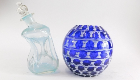 An art glass globular vase, with blue and white flash decoration of geometric bands, 18cm high, and a decanter and stopper, of sloping form. (2)