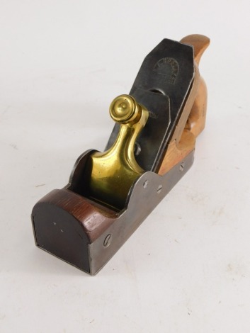 An early 20thC M A Hobday wood plane, the shaped handle stamped A J Jones, with brass and metal mounts, 13cm high.