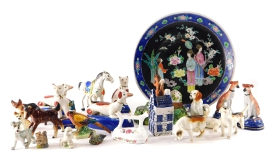 Various Staffordshire pottery, Beswick fox, 6cm high, various hounds (AF), a squirrel headed NH porcelain nut bowl, Oriental plate, etc. (a quantity)