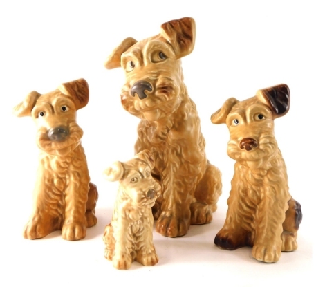 A graduated set of four Sylvac pottery dogs, in brown, number 1380, 30cm high, etc., impressed marks beneath. (4)