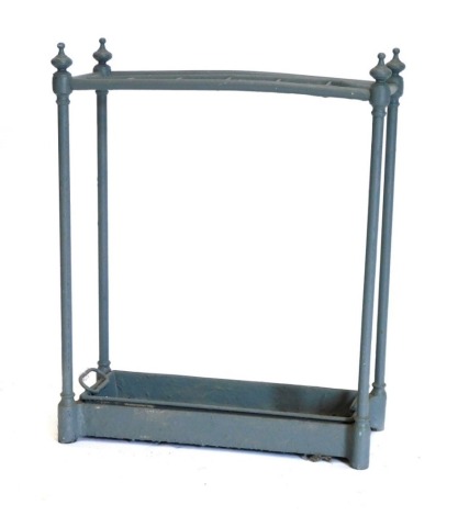 An Edwardian grey painted cast iron twelve division umbrella stand, with turned finials, 50cm wide.