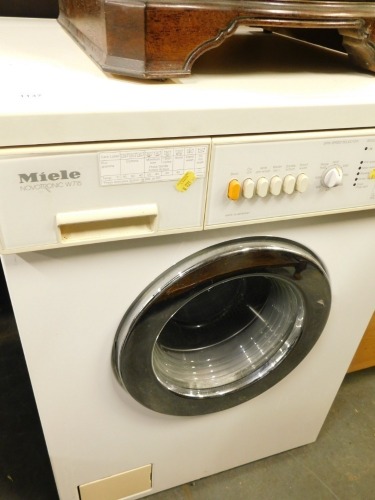 A Miele Novotronic W715 washing machine. WARNING! This lot contains untested or unsafe electrical items. It is supplied for scrap or re-conditioning only. TRADE ONLY