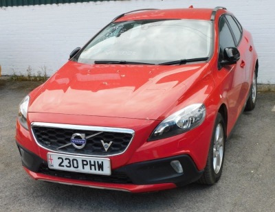 A Volvo V40 hatchback car, registration 230 PHW, first registered March 2016, 1969cc diesel, red, automatic, MOT expired 28th February 2022, last service book stamp, service no. 5, 12th February 2021, 8,828 miles (Marshall Volvo, Grantham), V5 present. To