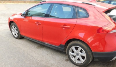 A Volvo V40 hatchback car, registration 230 PHW, first registered March 2016, 1969cc diesel, red, automatic, MOT expired 28th February 2022, last service book stamp, service no. 5, 12th February 2021, 8,828 miles (Marshall Volvo, Grantham), V5 present. To - 5