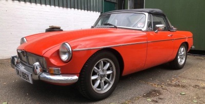 A 1982 MG MGB Sports car, soft top, historic vehicle, registration DMJ 186X, petrol, orange/red, first registered 08/04/1982, MOT expired 30/06/22.